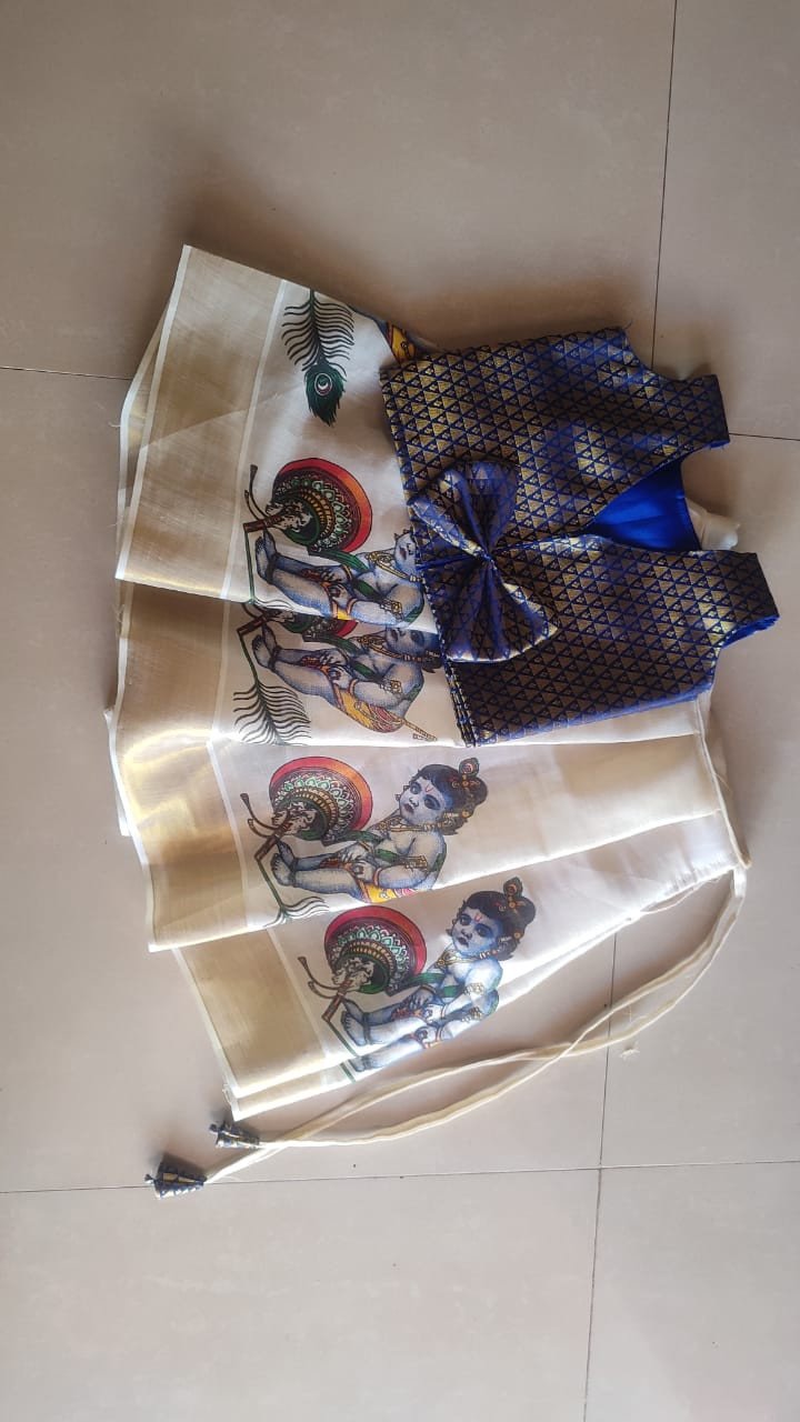Avanika Collection's Pure Cotton Krishna Printed Stitched Pattu Pavada Set With Lining - White & Blue Colour | Kerala Style Stitched Skirt & Jacket